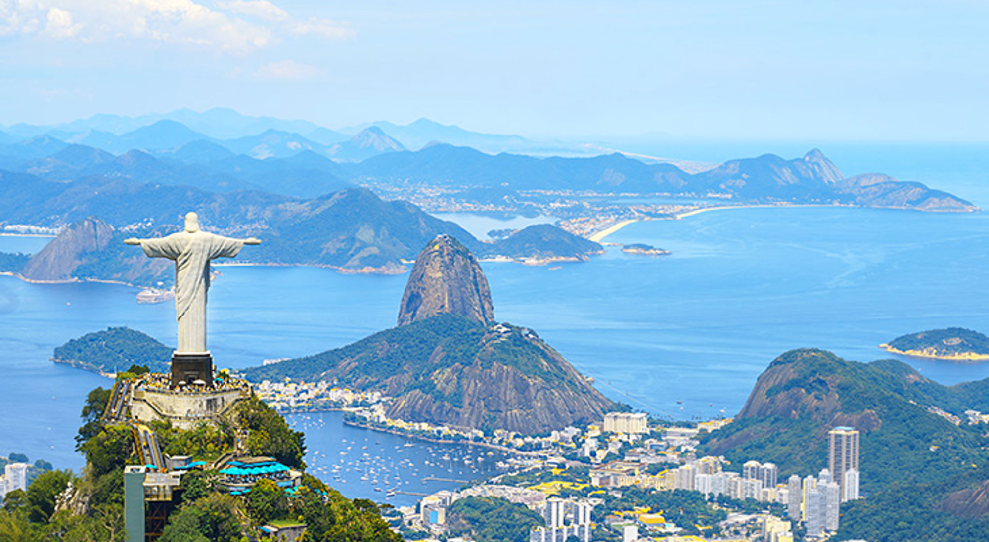 De mooiste stad ter wereld Rio de Janeiro Christus de Verlosser met uitzicht op Rio de Janeiro, Suikerbroodberg en de baai.