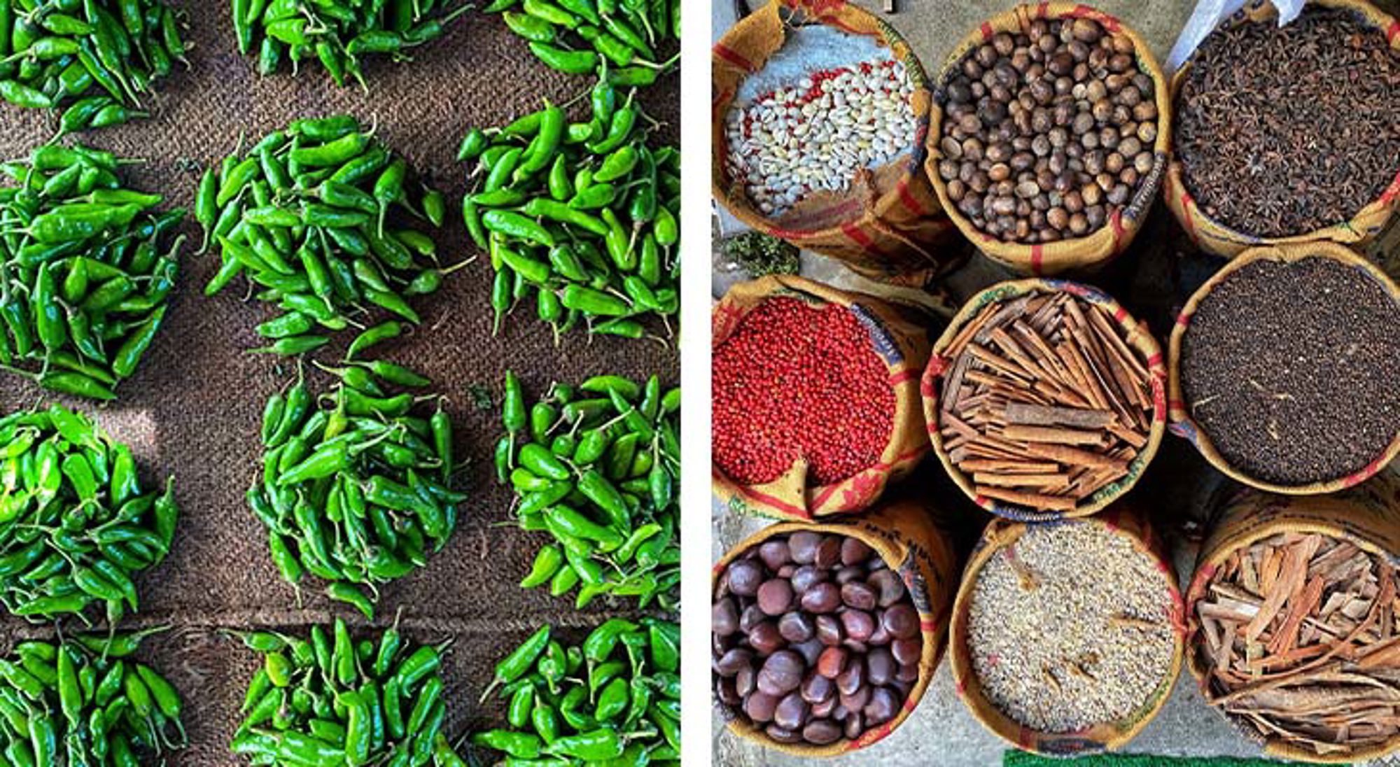 Kleuren in Zuid-India Groene pepers en diverse specerijen in zakken op een markt.