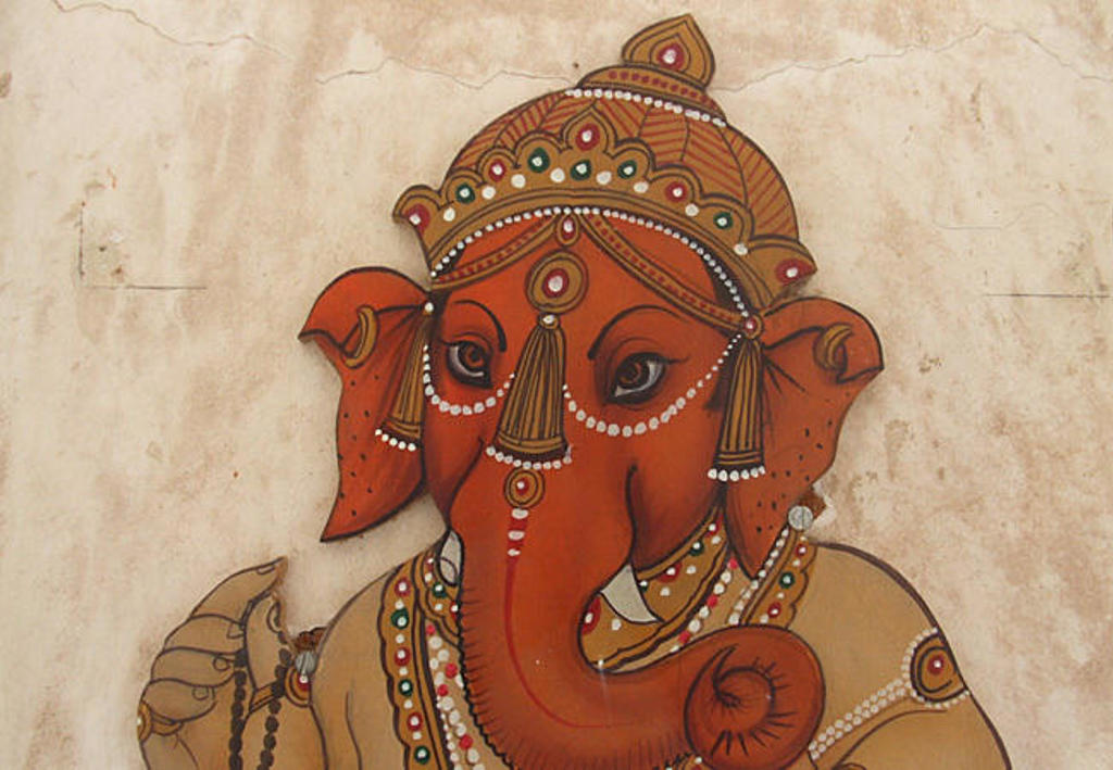 Schildering van de hindoegod Ganesha met kroon en sieraden, Zuid-India.