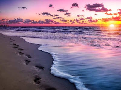 Zonsondergang aan het strand van Cancún, start van de Route Ruta Maya-reis.
