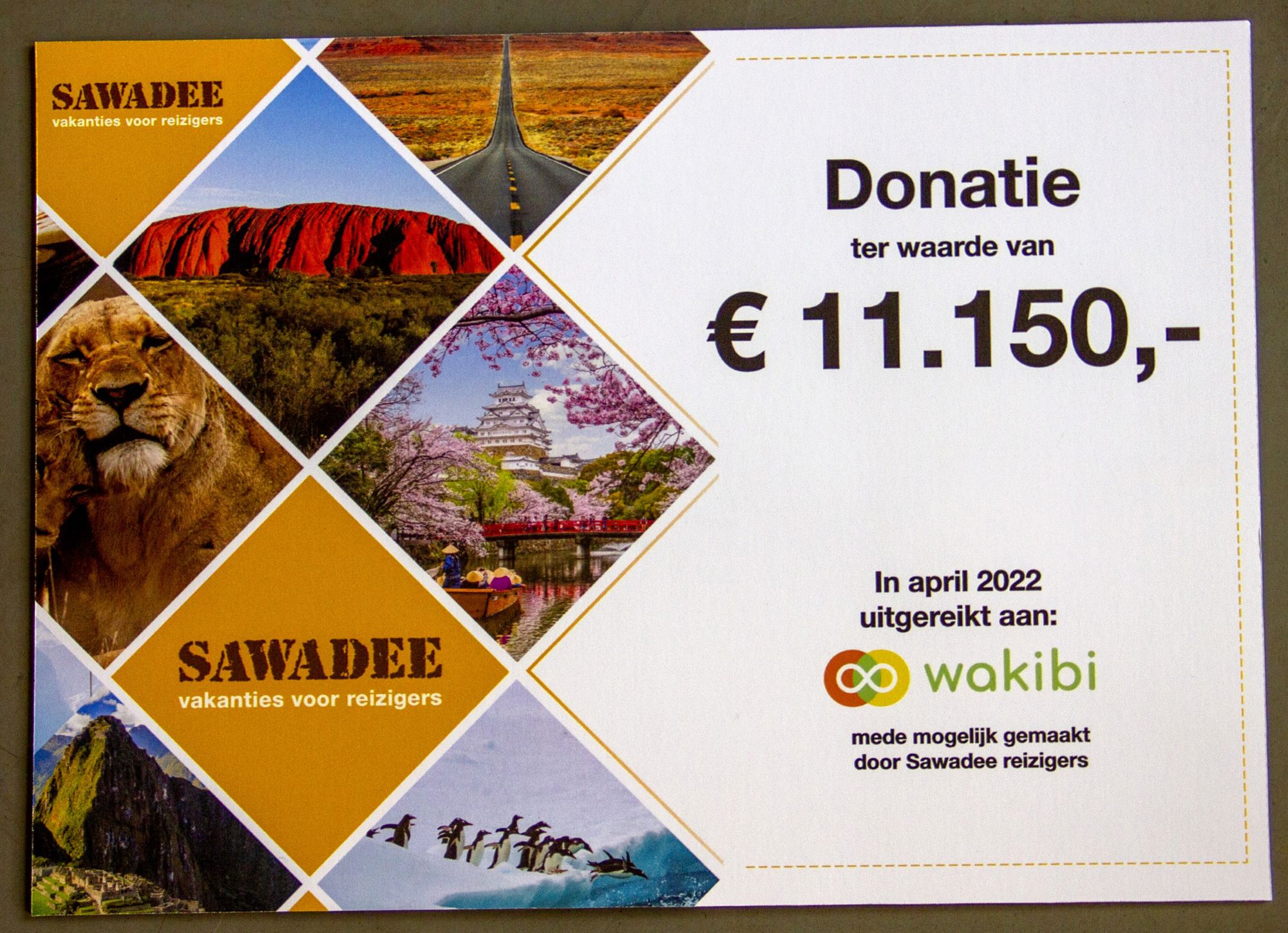Donatiecertificaat van Sawadee ter waarde van € 11.150 voor Wakibi, uitgereikt in april .