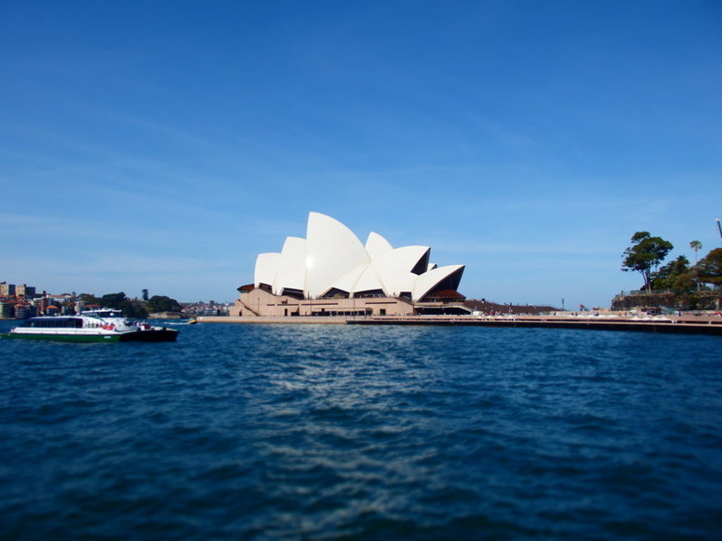 Sydney Opera House aan de haven tijdens een groepsrondreis Australië & Nieuw-Zeeland.